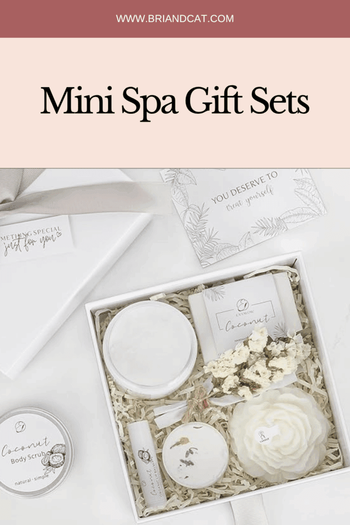 A beautifully arranged mini spa gift set featuring coconut-scented products, including a body scrub, lotion, a soap bar, and decorative elements like dried flowers, all presented in a white box with an elegant ribbon.