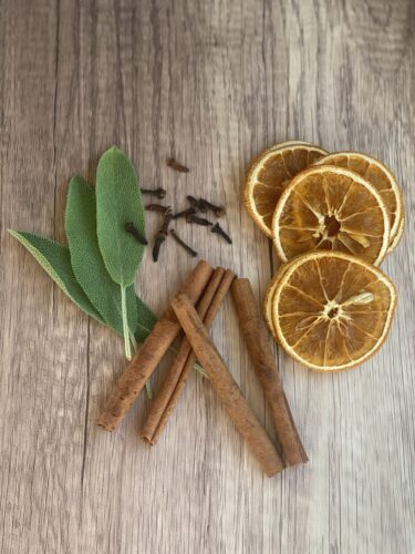 Cinnamon, sage, cloves, and dried oranges- fall simmer pot recipe