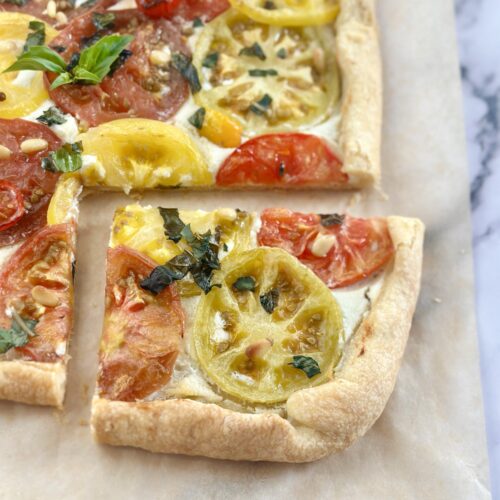 Heirloom tomato puff pastry tart served